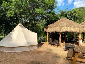 Relaxation and Fun Combined Glamping Tents M & In-Water Picnic Table L in Kingsbury, TX