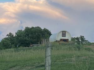Glenwood Glamping Vacations at this Charming Covered Wagon Rental in Iowa