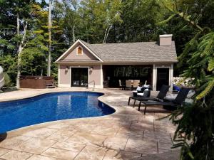 Glamorous Cottage Rental with Outdoor Lounge and Pool on 40 Acres in Pine Bush, New York