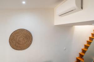 Cozy Ground Floor Studio with AC and Loft Bedroom by Lisbeyond