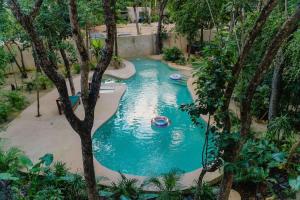 Holistika 9BR Jungle Estate with Private Rooftop & Plunge Pools