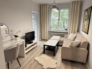 Jasny Apartament z Parkingiem Główne Miasto w Gdańsku by Noclegi Renters