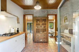 Casa de Andrães Camélias