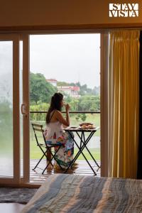 StayVista at Aarna Estate with library, lawn