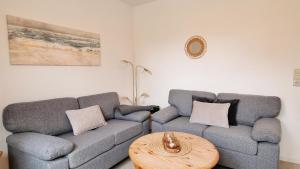 Ferienwohnung "Achtern Diek 1" 1 Reihe an der Ostseeküste