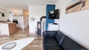 Zauberhafte Ferienhaushälfte Küstenliebe am Sehlendorfer Ostseestrand