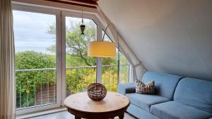 Ferienwohnung "Achtern Diek 4" 1 Reihe an der Ostseeküste