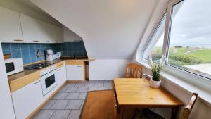 Ferienwohnung "Achtern Diek 4" 1 Reihe an der Ostseeküste