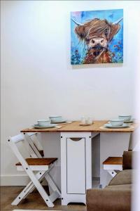 Modern Comforts – 4 Bedroom Home for Work & Play