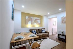 Modern Comforts – 4 Bedroom Home for Work & Play