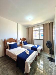 Quarto na Av Beira mar em Apto familiar