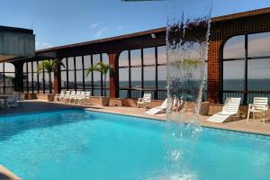 Sensacional Flat pé na areia na Praia da Costa