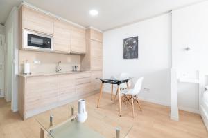 Estudio Vigo by Plaza España