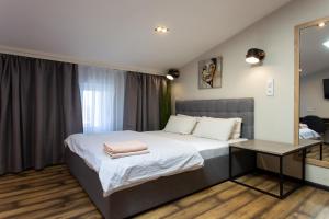 Мансардна квартира біля ТРЦ Нікольський - Харківська набережна 3