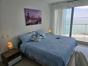 Ikigai frente al mar con piscina infinita y Gym