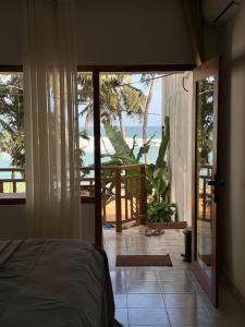 Coconut Palm beach restaurant and rooms