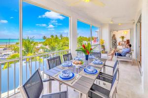 Ocean View Duplex Penthouse Retreat amenities: tennis court heated Pool Vista Key One