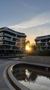 Bright Flat with Pool & Private Beach 750m to Sea