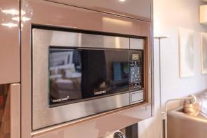 Majestic 2BR Residence with garden view in Regent