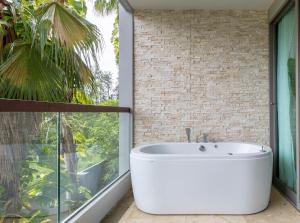 Majestic 2BR Residence with garden view in Regent