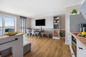 Ferienwohnung LangeBank mit Hafenblick, App 1, Olpenitz