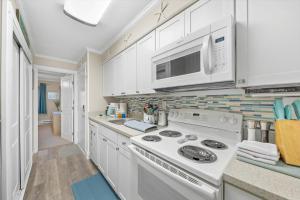 Oceanside Condo w Pool Steps to Beach