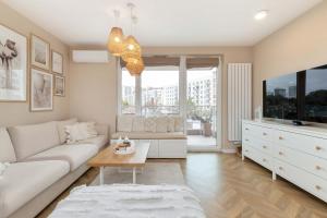Beige Apartment in Gdańsk with Air Conditioned Living Room, Parking and Desk by Renters Prestige
