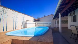Piscina, Ar condicionado, Churrasqueira, 4dorm