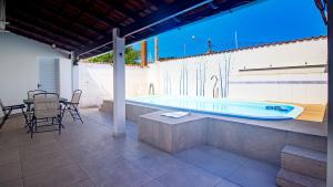 Piscina, Ar condicionado, Churrasqueira, 4dorm