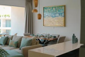 Stylish Playacar Condo with Balcony & Pool