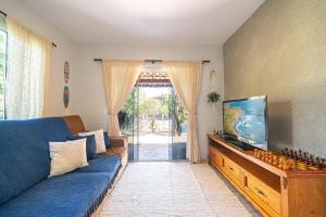 Casa Ohana 2Q perto da praia do Campeche by Achei