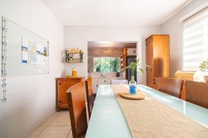 Casa Ohana 2Q perto da praia do Campeche by Achei