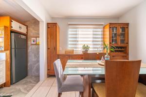 Casa Ohana 2Q perto da praia do Campeche by Achei