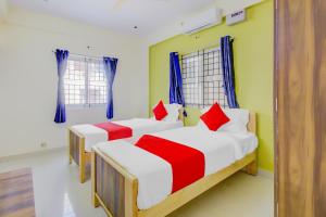 Hotel O Nelli Suites