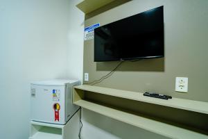 Flat c Wi-Fi e Ar-condicionado Perto do Aeroporto