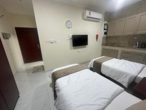 Gloria Suites اجنحة جلوريا