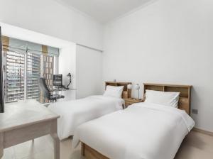 2BR In The World-Famous Twisted Skyscraper