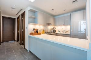 High-Floor 2BR with Skyline Views, Steps from a Park, Minutes Drive to Meydan Golf Club and Ras Al Khor Wildlife Sanctuary, Sobha Hartland The Crest Tower C, Sobha Hartland by Deluxe Holiday Homes