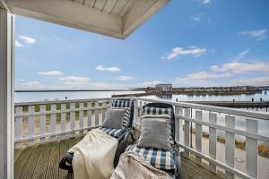 Haus am Strand - Ferienwohnung für 4 in Olpenitz mit Dachterrasse, Strandzugang und Ostseeblick