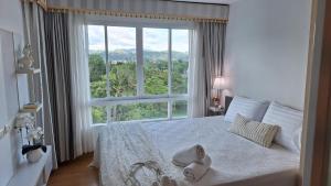 Plus 2 condo by Tida 111