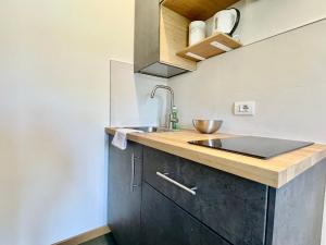 Bilocale con balcone e piscina a Riccione