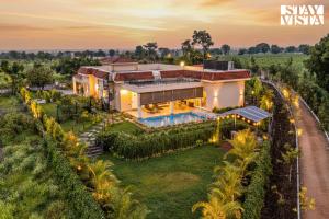 StayVista at Evaarah with Bonfire, Pool