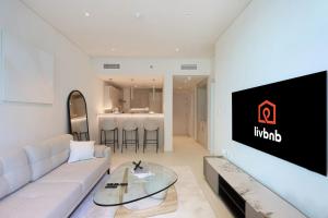 Beachfront 1BR Seven Palm Rooftop Pool & Views