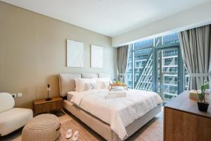 Beachfront 1BR Seven Palm Rooftop Pool & Views