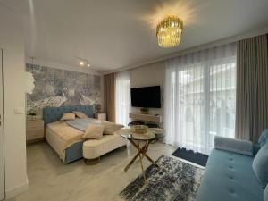 Apartament Holiday Paris Blue - 3hvězdičkové hotely ve městě Rewal