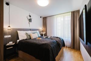 Prague Days - 1BDR Apt w Garage & 65" TV & 200Mbs Wifi