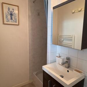 Bel appartement décoré avec goût, face à la gare