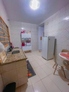 Casa de Frente com Maria