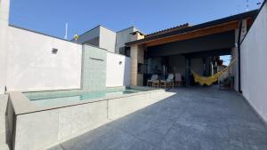 Casa Moderna para Familias com Piscina Churrasqueira Wi-Fi e Ar Condicionado