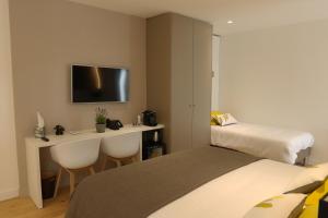 Hotels Cit'Hotel Le Cornouaille Hotel : photos des chambres